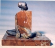 Bronce y piedra<br>Measures: 20x30x15 cm<br>Series: 10 units.